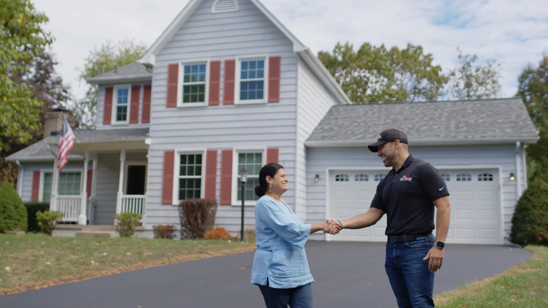 rep homeowner handshake by American Home Contractors near Odenton