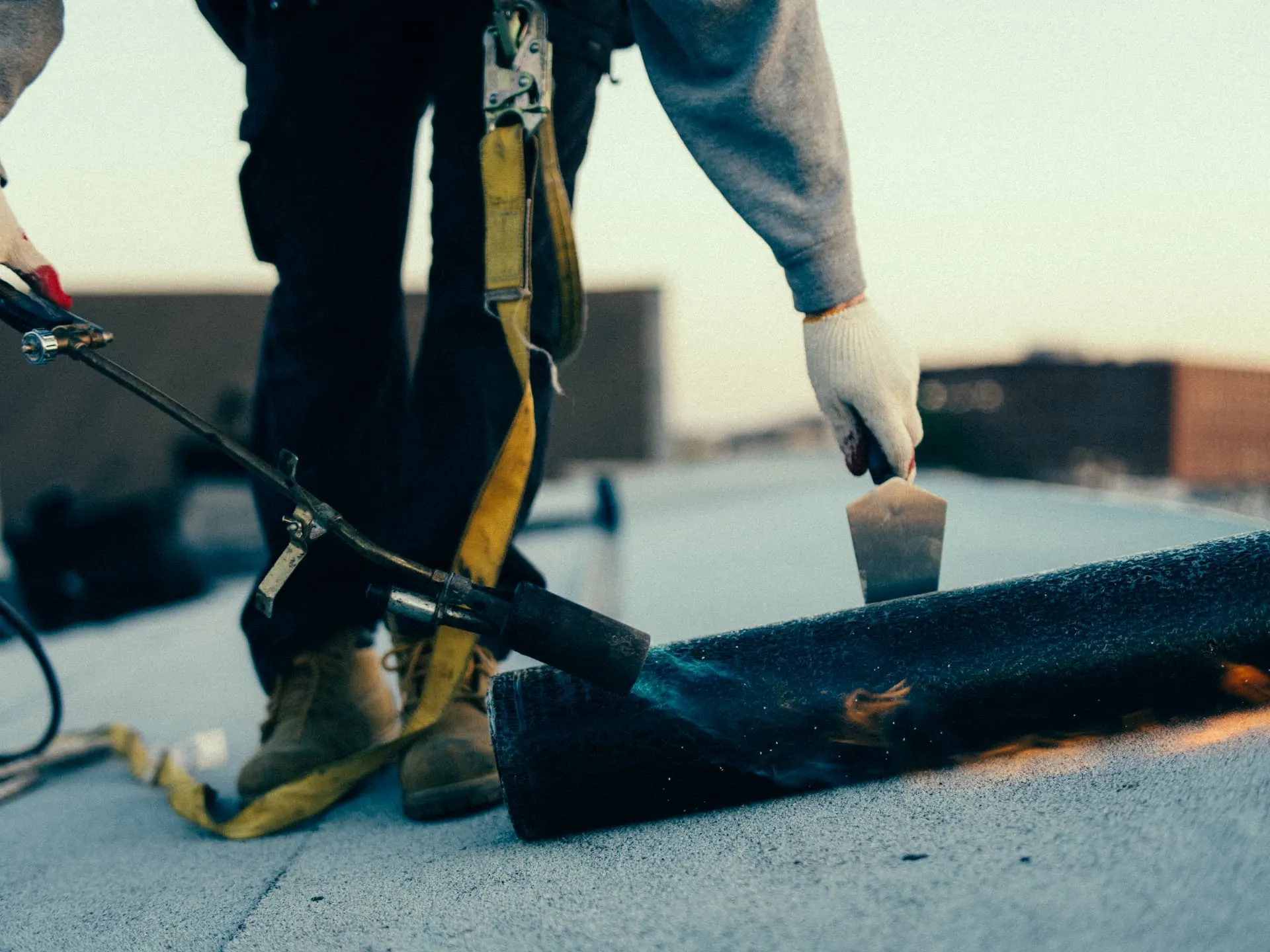 flat roof torch trowel seam by American Home Contractors near Severn
