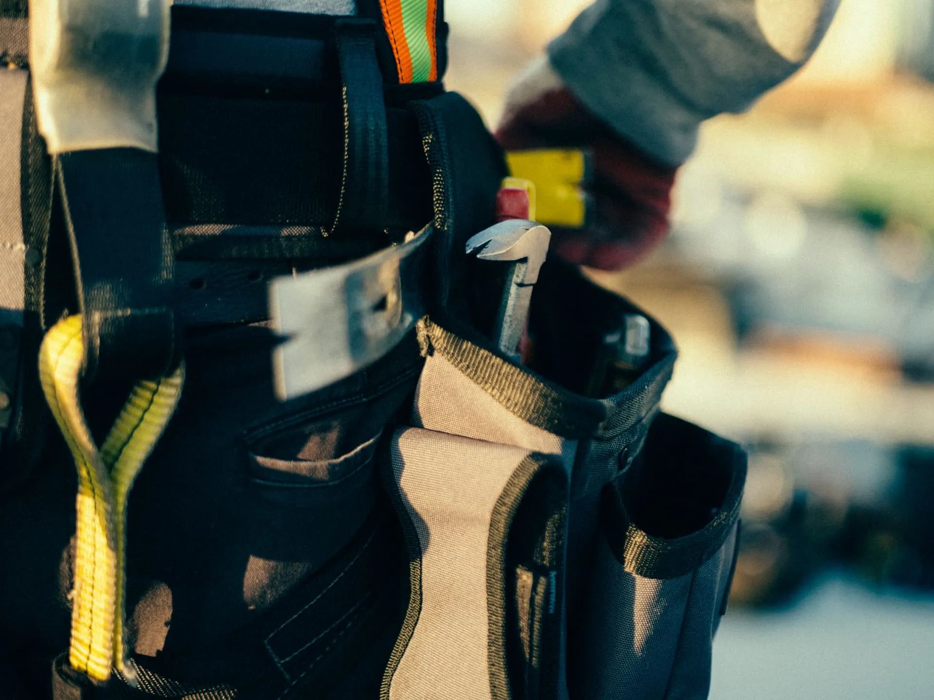 roofer tool belt detail by American Home Contractors near Bethesda