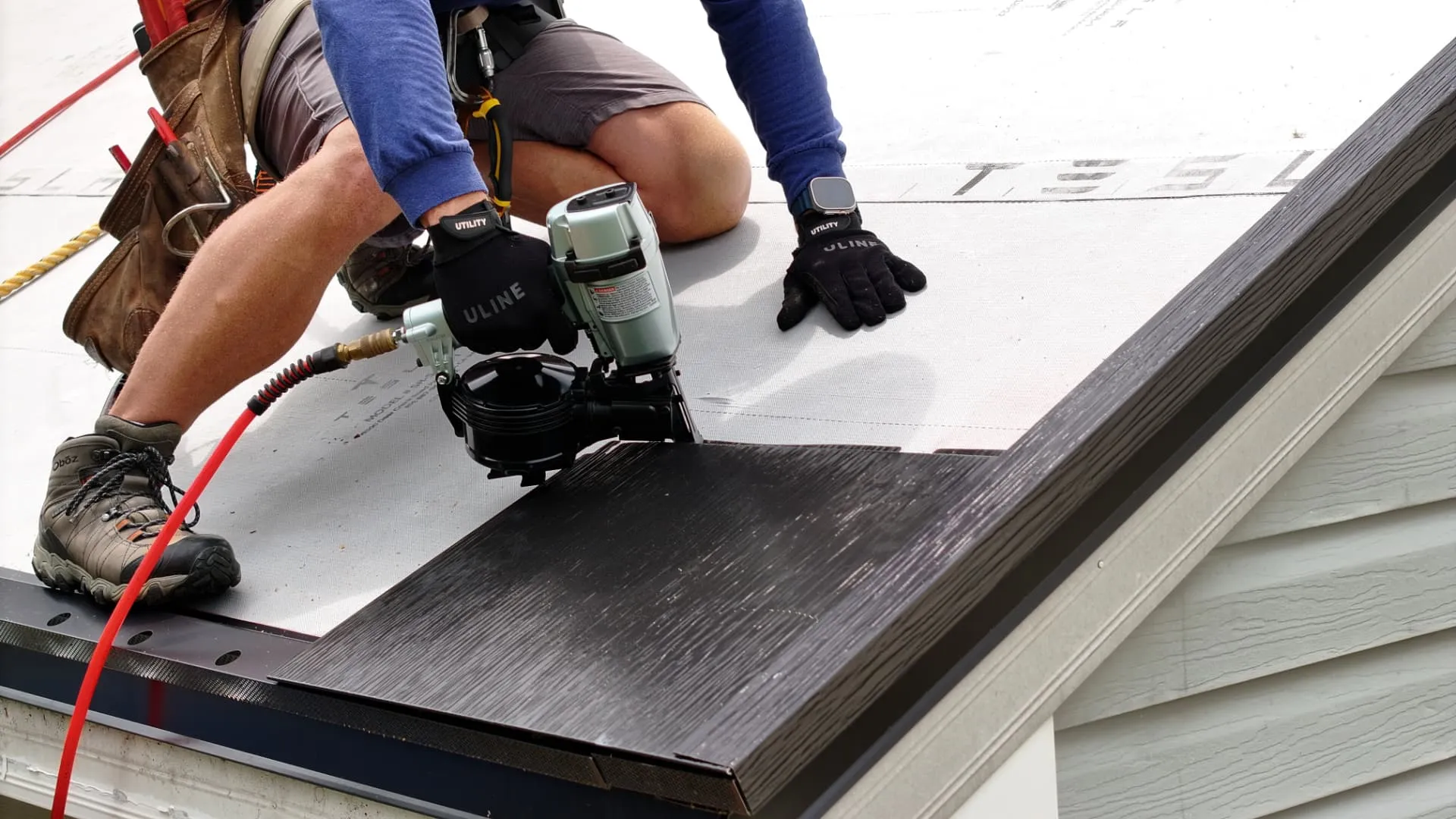 tesla solar roof nailing closeup by American Home Contractors near Bethesda